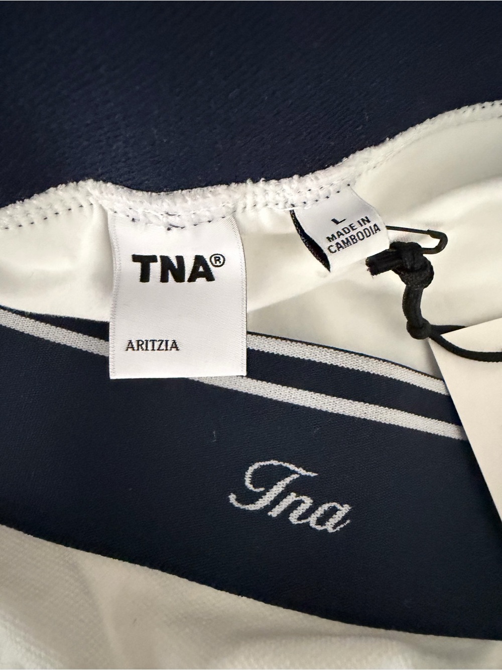ARITZIA Tna White Pleated Tennis Skirt with Navy Waistband
